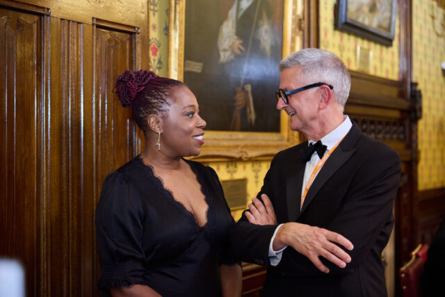 Alumni Michele Austin stood in conversation at the House of Lords